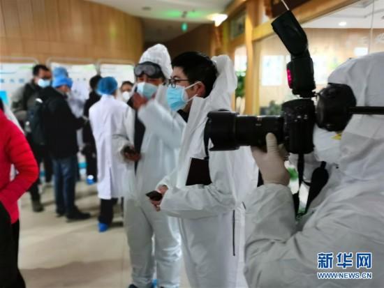 戰“疫”的一天——新華社記者直擊湖北保衛戰