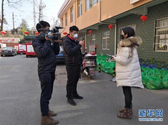 戰“疫”的一天——新華社記者直擊湖北保衛戰