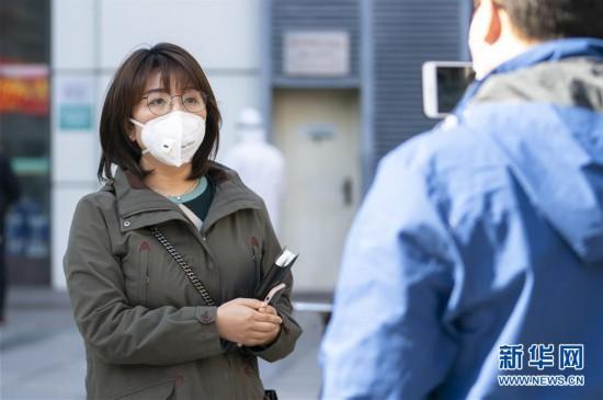 戰“疫”的一天——新華社記者直擊湖北保衛戰