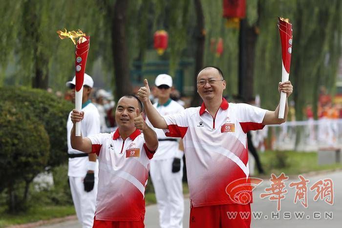 十四運會和殘特奧會火炬在咸陽傳遞 68名火炬手接力傳遞