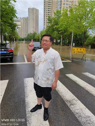 政協委員孫煥文:大雨中的“愛心行走”