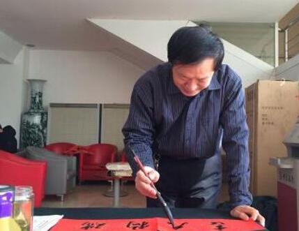 聊城市直書畫家協會來中國人民銀行聊城分行“百聯迎春”大型活動